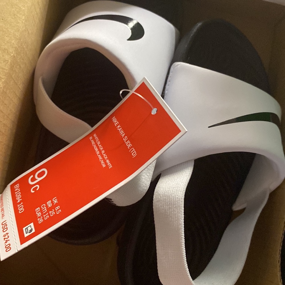 Brand new never worn. Nike sandles 9C